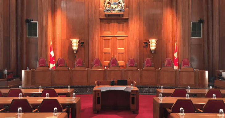 Court reporter recording proceedings during a hearing
